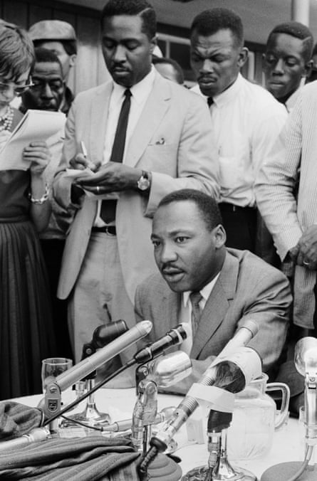 Jones takes notes as King gives a press conference in Birmingham, Alabama, in February 1963.