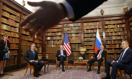 A security officer indicates to the media to step back as US president Joe Biden, US Secretary of State Antony Blinken, Russia’s President Vladimir Putin and Russia’s Foreign Minister Sergei Lavrov meet for the US-Russia summit in Geneva.