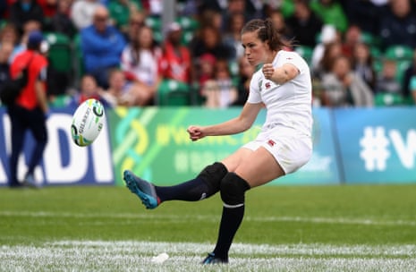 Emily Scarratt of England kicks a conversion from her own try.