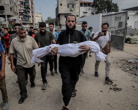 Relatives and loved ones of Palestinians, who lost their lives in Israel's attacks on different parts of the Gaza Strip, mourn their loss as the bodies are brought to Shifa Hospital for funeral procedures in Gaza City, Gaza on July 12, 2025.