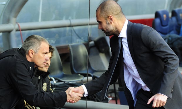 José Mourinho and Pep Guardiola greet each other before the title decider at Camp Nou in April 2012.