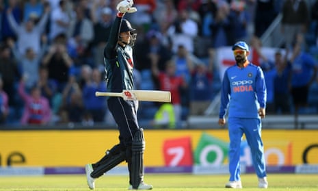 England’s Joe Root drops his bat in celebration after reaching his century, hitting a four on the day’s final ball. 