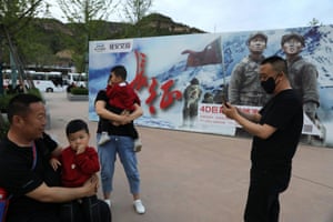 A bollboard advertises a film about the Long March, in Yanan in Shaanxi province