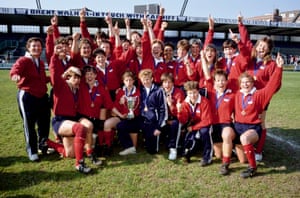 Victorious USA players celebrate with the Womens Rugby Union World Cup Trophy after their victory in the Final against England played at Cardiff Arms Park on April 14th, 1991.