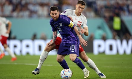 Poland's Piotr Zielinski shadows Argentina's Lionel Messi