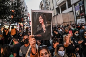 Istanbul, Turkey. A protester holds a portrait of Mahsa Amini during a demonstration in support of the Iranian woman who died after being arrested in Tehran by the Islamic Republic’s morality police