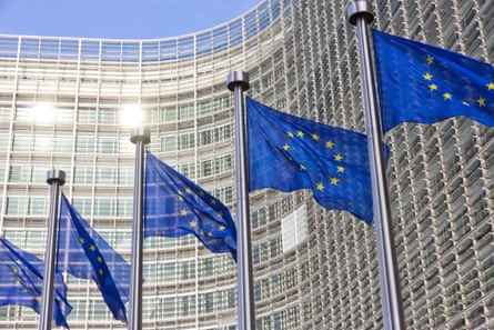 Flags in front of the EU Commission building in Brussels.