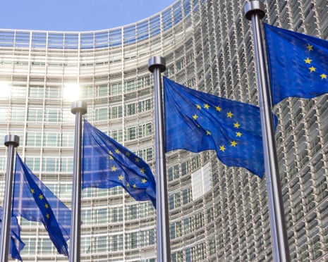 Flags in front of the EU Commission building in Brussels.
