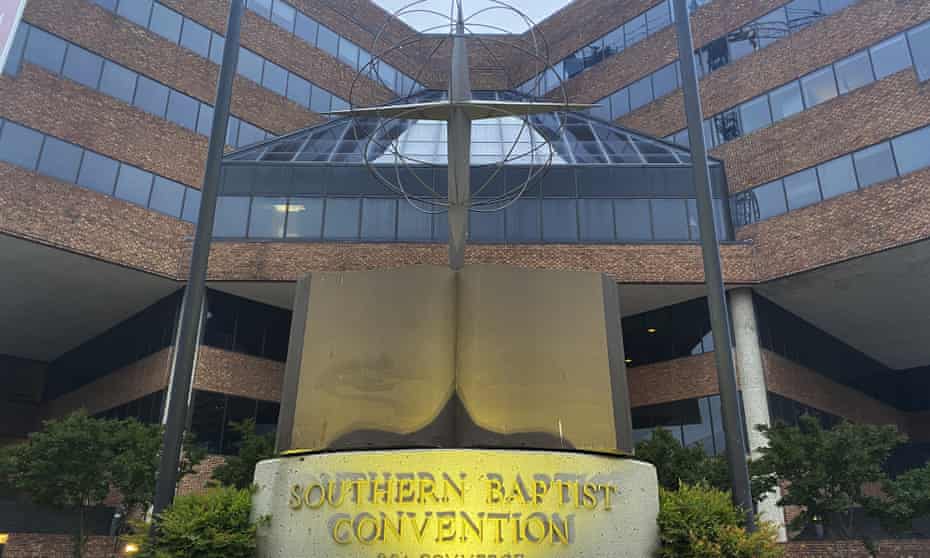 The front of a building labeled 'Southern Baptist Convention' features a stone bible and a cross.