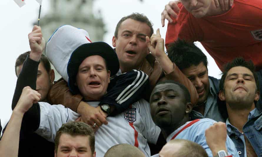 Paul Gascoigne celebrates with fans in Trafalgar Square in 2002.