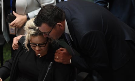 Daniel Andrews embraces health minister Jill Hennessy after the bill passes.