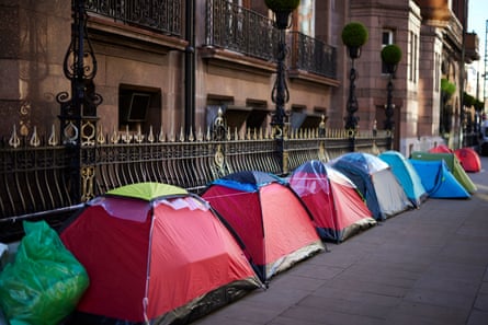 A row of tents outside the Midland hotel