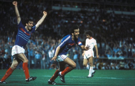 Michel Platini scores for France against Portugal.