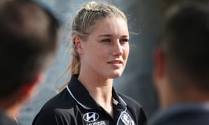 Prime minister Scott Morrison says trolls who targeted AFLW player Tayla Harris on social media are ‘cowardly grubs’