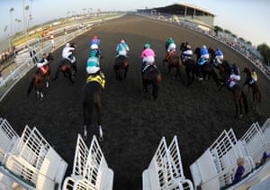 The field breaks from the starting gate at the start of the 2009 Breeders’ Cup Classic at Santa Anita Park in California. Zenyatta,, third from left, is last out of the stalls.