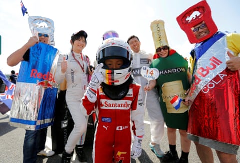 Sport picture of the day: Japanese F1 fans dress to impress | Formula One 2016 | The Guardian Sport picture of the day: Japanese F1 fans dress to impress | Formula One 2016 | The Guardian