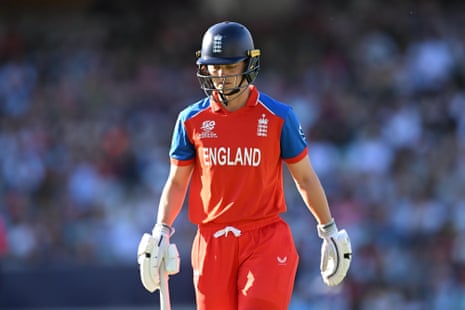 Amy Jones of England looks dejected as she walks back to the pavilion after being dismissed by Shabnim Ismail of South Africa.