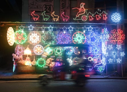 A shop in San Fernando sells fairy lights and artificial trees.