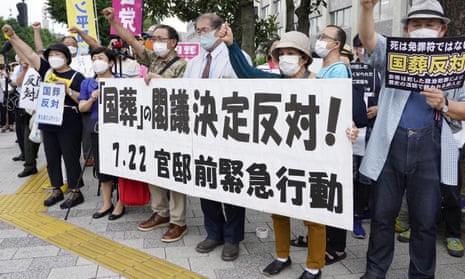 Protesters hold a rally outside the prime minister’s office in Tokyo against the decision to hold a state funeral for Shinzo Abe