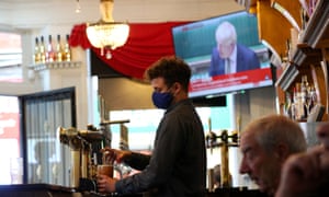 Coronavirus - Mon Oct 12, 2020<br>A member of staff pours a drink in the Richmond pub in Liverpool as Prime Minister Boris Johnson reads a statement on television, as parts of the North of England are bracing themselves for the most stringent Tier 3 controls, with Merseyside expected to have its pubs, gyms and casinos closed in a bid to suppress its infection rate. PA Photo. Picture date: Monday October 12, 2020. See PA story HEALTH Coronavirus. Photo credit should read: Peter Byrne/PA Wire