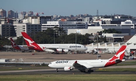Qantas planes are seen at Kingsford Smith International Airport in Sydney<br>Qantas planes are seen at Kingsford Smith International Airport, following the coronavirus outbreak, in Sydney, Australia, March 18, 2020. REUTERS/Loren Elliott