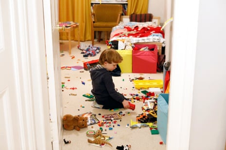 Francis passes time alone playing in his room.