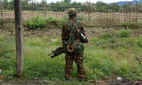 An armed soldier stand guards in Rakhine state, western Myanmar