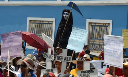 People protest against violence and insecurity and demand justice over the murder of Honduran high-profile indigenous environmental activist, Berta Caceres.
