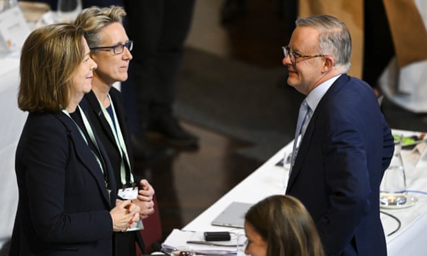 Australian prime minister Anthony Albanese speaks to Australian Council of Trade Unions president Michele O'Neil and secretary Sally McManus during the jobs and skills summit at Parliament House