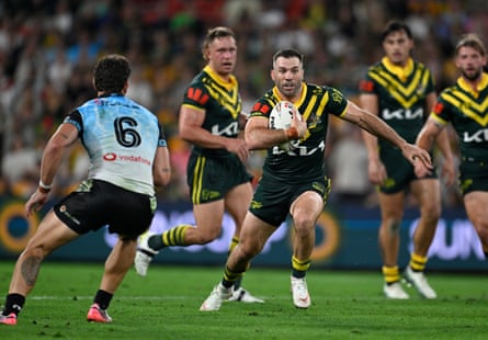 James Tedesco runs with the ball