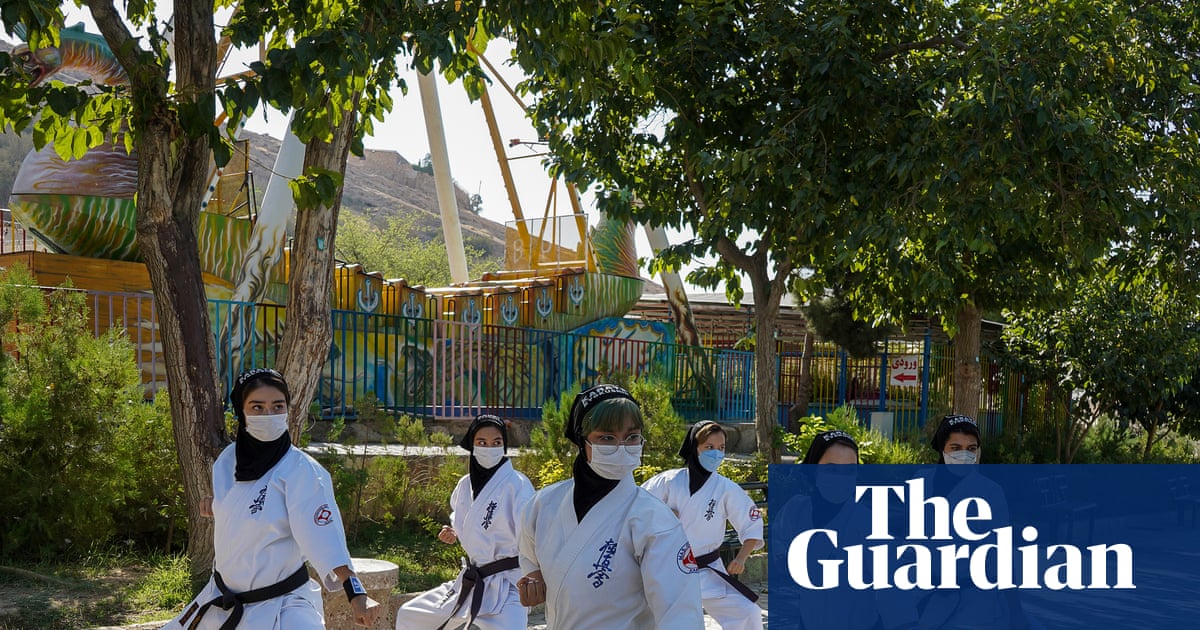 ‘It’s more than martial arts – we teach courage‘: the Afghan sisters honing karate skills in Iran