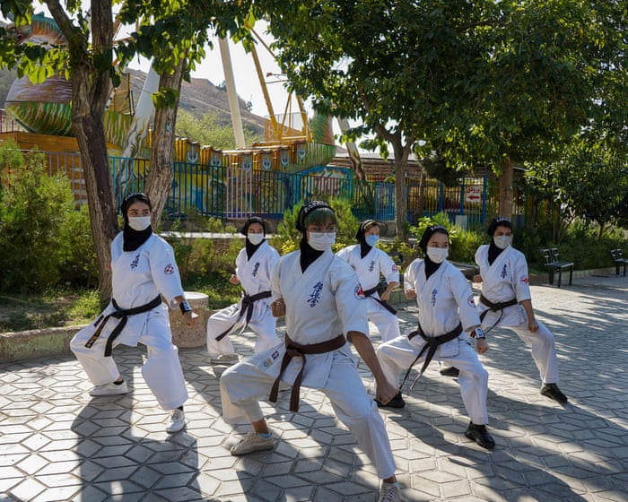 ‘It’s more than martial arts – we teach courage‘: the Afghan sisters honing karate skills in Iran