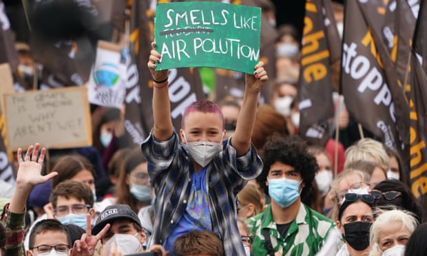 Fridays For Future global climate action day in Berlinepa09485027 A protester holds cardboard reading ‘smells like air pollution’ during the Fridays For Future global climate action day in Berlin, Germany, 24 September 2021. Climate activists of Fridays For Future call for socially fair and consistent measures to limit climate heating to 1.5 degrees Celsius ahead of German federal elections, that take place on 26 September 2021. The young activists are planning hundreds of protests and demonstrations worldwide during a ‘climate strike’ on 24 September 2021. EPA/CLEMENS BILAN