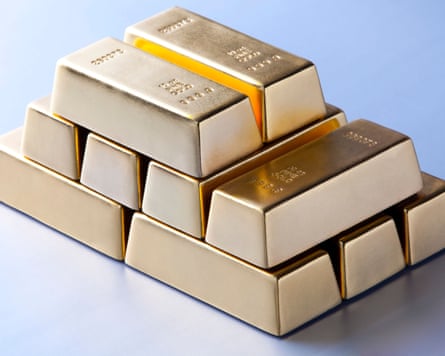 A stack of gold bullion bars