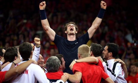 Great Britain’s Andy Murray is mobbed by his team-mates