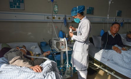 Covid patients fill a hospital ward in Fuyang, China, earlier this month