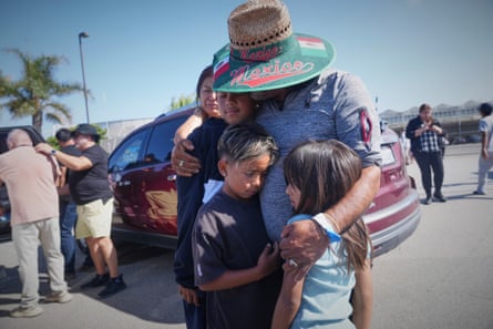 a person hugs children