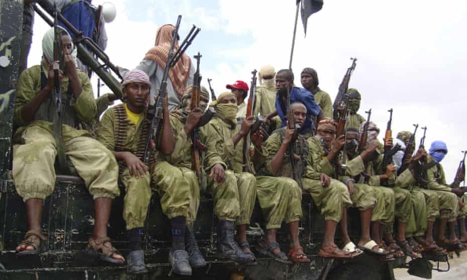 al-Shabab fighters sit on a truck in Mogadishu, in a picture taken in 2009.