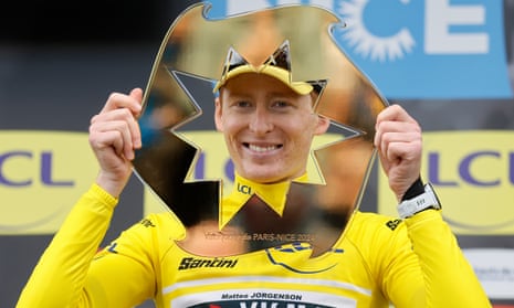 Matteo Jorgenson of Visma Lease A Bike, poses with his trophy after the final stage of the Paris-Nice race.