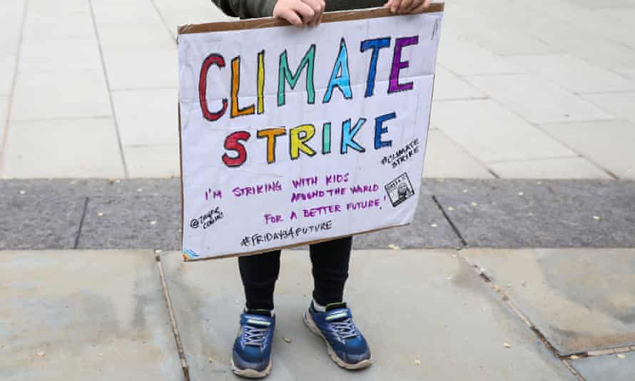 A child holds a placard at a protest in New York