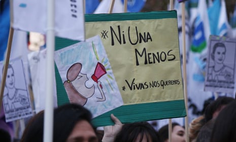A protester in Buenos Aires holds a placard bearing the words ‘Ni Una Menos’ – ‘Not one less’ – during a women’s rights rally