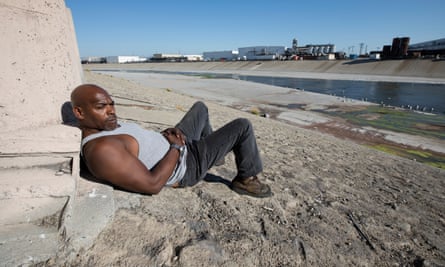 Juan King near the LA River, one of the places he lived when he was homeless.