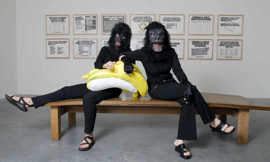 Two of the Guerrilla Girls pose at a Tate Modern exhibition in 2006
