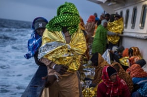 Mediterranean sea: Refugees on the deck of a Proactiva Open Arms rescue vessel, sailing towards the Italian port of Pozzallo after being spotted off the Libyan coast. The NGO rescued 466 people