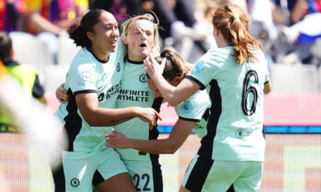 Erin Cuthbert is congratulated by her teammates after giving Chelsea a 1-0 lead against Barcelona.