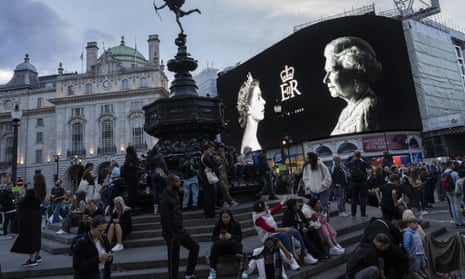 A tribute to the Queen is displayed on a giant screen at Piccadilly Circus in London.