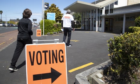A couple arrive to vote at a polling station in Auckland, New Zealand, in the 2020 election
