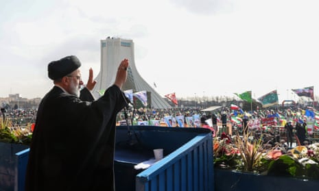 Iranian president, Ebrahim Raisi, greets crowds during the 44th anniversary of the 1979 Islamic Revolution, at the Azadi Square in Tehran on Saturday.
