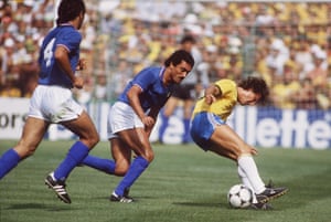Brazil’s Zico turns on the skill to get the better of Italy’s Claudio Gentile.
