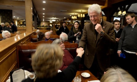 Bill Clinton greets diners at the Puritan Backroom in Manchester, New Hampshire.